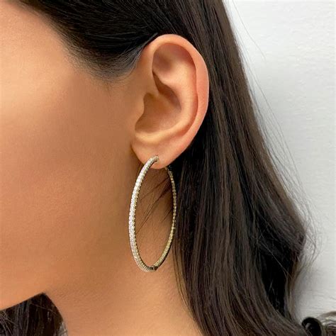 designer hoop earrings.